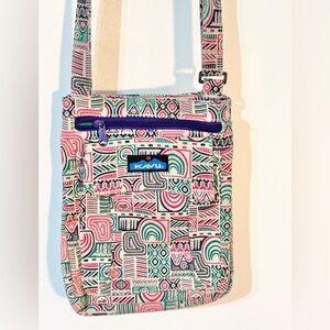 Kavu crossbody purse / bag. 4 pockets adjustable strap